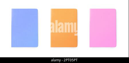Set with multicolor notebooks on white background, top view. Banner design Stock Photo