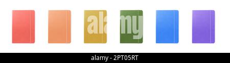 Set with multicolor notebooks on white background, top view. Banner design Stock Photo