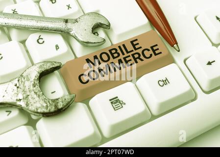 Writing displaying text Mobile CommerceUsing mobile phone to conduct commercial transactions online, Word Written on Using mobile phone to conduct com Stock Photo