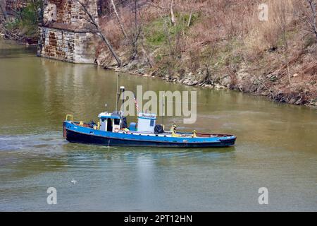 Boat navigating on Rocky River, Ohio Stock Photo