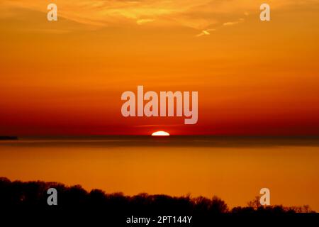 Colorful sunset over Lake Erie in Northeast Ohio Stock Photo