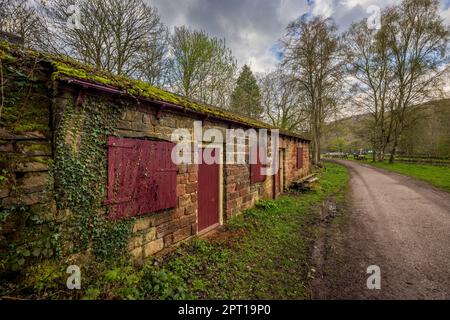 A disused railway building along the dismantled raiway along the Cromford Canal, Derbyshire, England Stock Photo