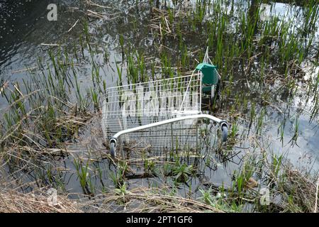 An abandoned shopping trolley from Morrisons supermarket at Cribbs Causeway Bristol UK Stock Photo