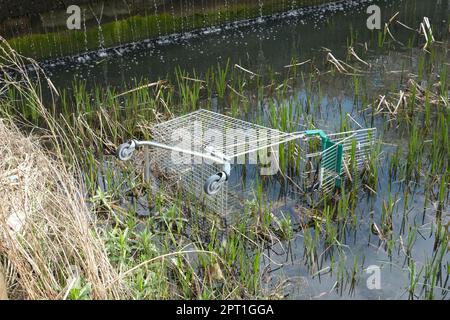 An abandoned shopping trolley from Morrisons supermarket at Cribbs Causeway Bristol UK Stock Photo