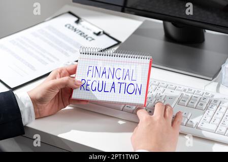 Hand writing sign Financial Regulation, Business idea aim to Maintain the integrity of Finance System Stock Photo