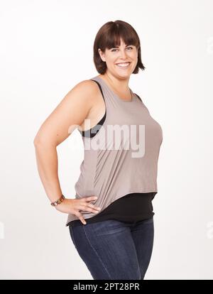 She knows who she is. Portrait of a pretty and curvy woman on a white  background Stock Photo - Alamy