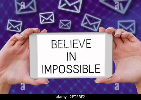 Handwriting text Believe In Impossible, Conceptual photo motivation and inspiration that you can make it happen Stock Photo