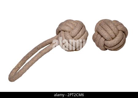Rope isolated. Close-up of two rope knote balls. Macro. Knoted rope dog toy. Stock Photo