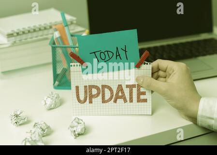 Text caption presenting Update, Word for up to date as by adding new information or making corrections Stock Photo