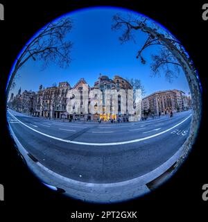 Fisheye view of Casa Batlló and Casa Amatller at the blue hour and night in the Bone of Contention (or Block of Discord) of Passeig de Gràcia (Spain) Stock Photo