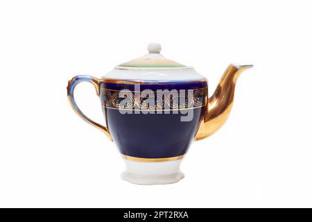 Old-fashioned beautiful gilded porcelain teapot on a white background Stock Photo