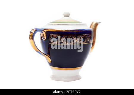 Old-fashioned beautiful gilded porcelain teapot on a white background Stock Photo