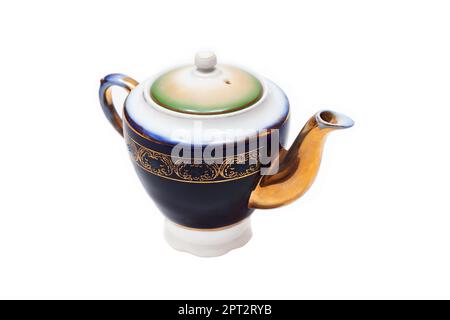 Old-fashioned beautiful gilded porcelain teapot on a white background Stock Photo