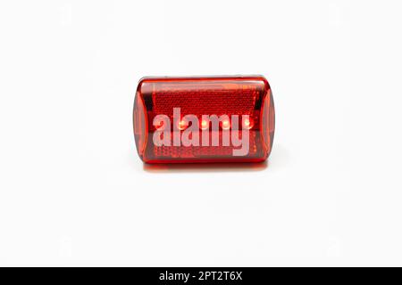 Red bicycle taillight isolated on white background Stock Photo
