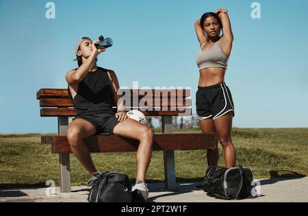 Woman, soccer and fitness stretching workout in city for football