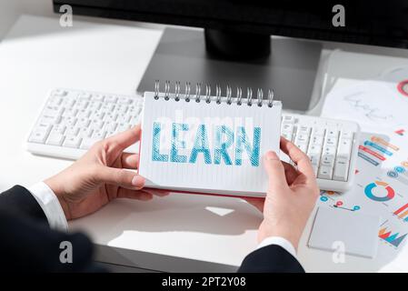 Handwriting text Learn, Word for process of acquiring new modifying existing knowledge behaviors Stock Photo