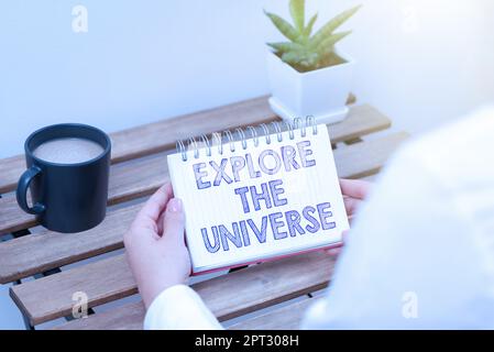 Hand writing sign Explore The Universe, Concept meaning Space and Scientific discovery of the galaxies Stock Photo