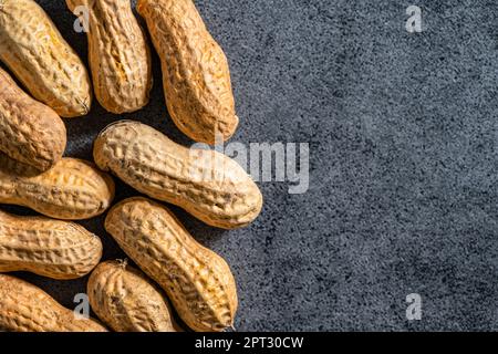 Roasted dry peanuts. Above shot. Close up. Stock Photo