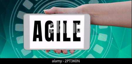 Sign displaying Agile, Business overview iterative approach to software delivery builds software incrementally Tablet With Important Message Over Clip Stock Photo
