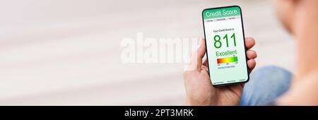 Good Score Credit On Mobile Phone. Debt Report App Stock Photo