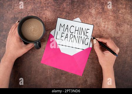 Inspiration showing sign Machine Learning, Word Written on the concept that a computer can learn new data itself Stock Photo