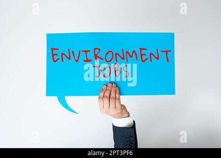 Writing displaying text Environment Jobs, Business showcase job of planning and managing large events or conferences Businessman Holding Speech Bubble Stock Photo