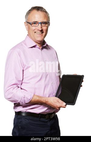 Staying abreast of new technology. Studio portrait of a mature man holding up a digital tablet with a blank screen Stock Photo
