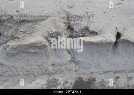 Patterns and textures of frozen ground in the winter Stock Photo