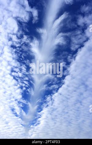 Rare weather phenomenon, a Hole Punch Cloud or Fallstreak hole (also known as a cavum, hole punch cloud, punch hole cloud, skypunch, cloud canal or cl Stock Photo