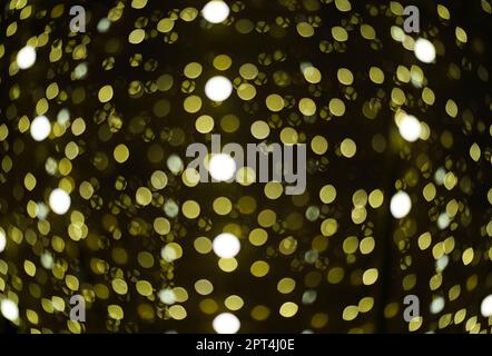 Abstract background with bright yellow lights and blurred bokeh Stock Photo
