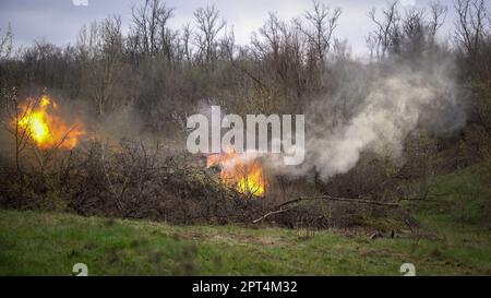 Ukrainian soldier from the 17th tank brigade is seen firing artillery rounds from a self-propelled howitzer at Ukrainian position near Bakhmut. Ukrainian armed force is fighting intensely in Bakhmut and the surrounding area as Russian forces are getting ever closer to taking the eastern city of Ukraine. The battle of Bakhmut is now known as “the bloodiest” and “one of the longest fight”, it has become one of the most significant fights in the war between Ukraine and Russia. Stock Photo