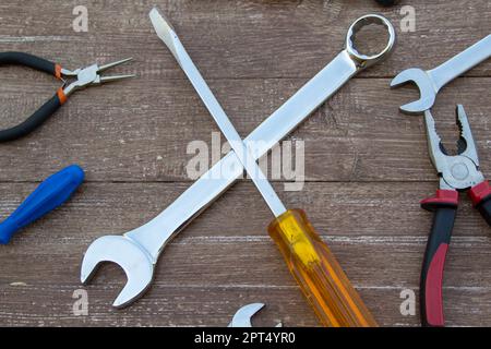 Images of various wrenches, screwdrivers, pliers and pliers. Tools of a handyman for repairs. Stock Photo