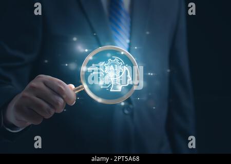 Businessman using chatbot on smartphone with Artificial Intelligence Stock Photo