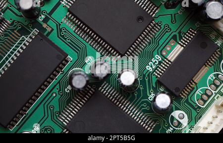 Semiconductor, processor, electronic industry background. Electronic circuit board with chip set. Stock Photo