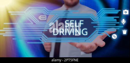 Sign displaying Self Driving, Word Written on Autonomous vehicle Ability to navigate without human input Stock Photo