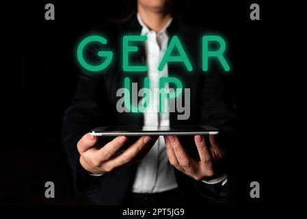 Conceptual caption Gear Up, Internet Concept Asking someone to put his clothes or suit on Getting ready fast Stock Photo