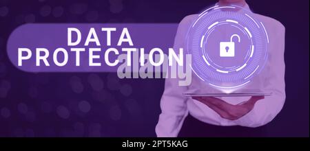 Hand writing sign Data Protection, Word Written on safeguarding information away from a possible data breach Stock Photo
