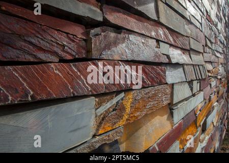 Natural colorful rust slate wall. Thick Slabs Stock Photo