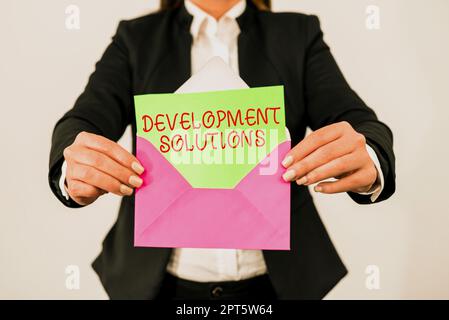 Writing displaying text Development Solutions, Concept meaning Efficient Planning based on the Company needs Stock Photo