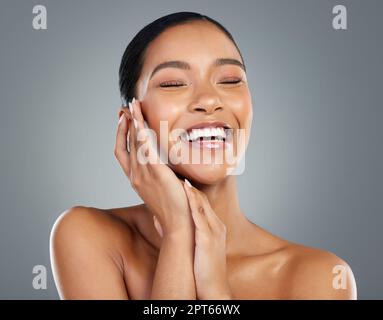 Im glowing like never before. a beautiful young woman posing against a