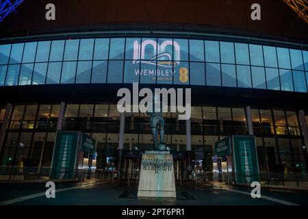 Wembley Stadium, London, UK. 27th April 2023. Night time view on the eve of the 100th birthday of England’s national stadium. Wembley Stadium marks it's centenary year with a changing display on the eve of it's 100th anniversary on 28th April. First opened in 1923, it has been home to some of the most historic and memorable moments of the last century. From the Olympics in 1948, the World Cup in 1966, Live Aid in 1985, to the Women’s EURO’s in 2022.  Photo by Amanda Rose/Alamy Live News Stock Photo