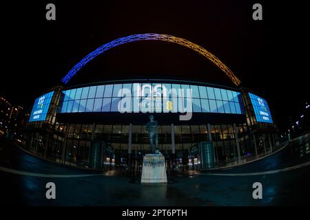 Wembley Stadium, London, UK. 27th April 2023. Night time view on the eve of the 100th birthday of England’s national stadium. Wembley Stadium marks it's centenary year with a changing display on the eve of it's 100th anniversary on 28th April. First opened in 1923, it has been home to some of the most historic and memorable moments of the last century. From the Olympics in 1948, the World Cup in 1966, Live Aid in 1985, to the Women’s EURO’s in 2022.  Photo by Amanda Rose/Alamy Live News Stock Photo