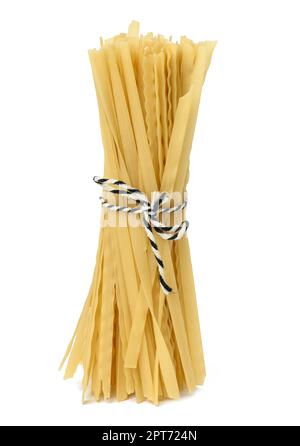 Raw long pasta tied with a rope on a white isolated background Stock Photo