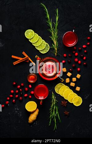Composition with tonic drink with cranberry, ginger, lemon, honey and mint Stock Photo