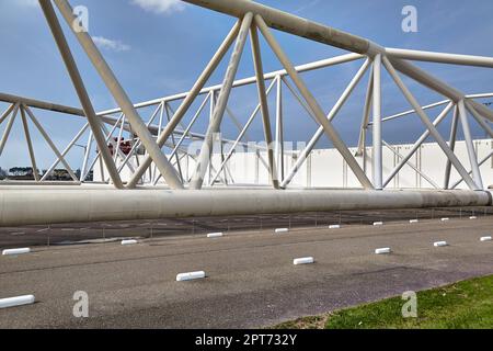 Huge steel structures of the storm surge barrier Maeslantkering near Rotterdam, protecting the Netherlands against flooding as part of the Delta Works Stock Photo