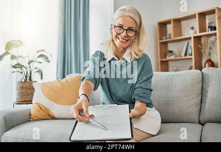 Therapy documents, consultation and senior psychologist consulting with paperwork in office at a clinic. Portrait of a mature healthcare therapist ask Stock Photo