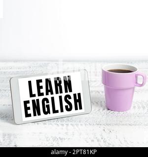 Handwriting text Learn English, Concept meaning to train writing and speaking, focusing on the global language Stock Photo