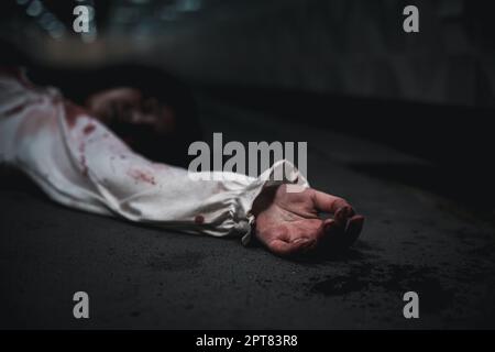 Homicide female hands jerky in blood with resentment torture and ask for help, murder and crime, Closeup hand with blood of horror bloodthirsty ghost Stock Photo