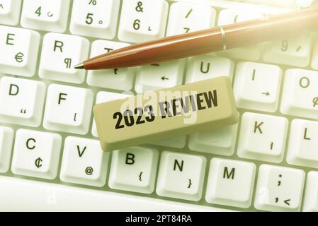 Conceptual caption 2023 Review, Business concept seeing important events or actions that made previous year Stock Photo