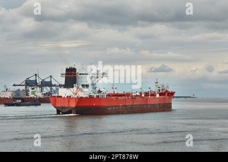 Industrial tanker ship at the entrance of the Port of Rotterdam Stock Photo